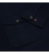 Thumbnail Close-up of navy shirt cuff and chest pocket flap.